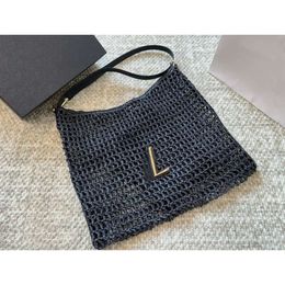 Designer Luxe mode Mashions Lente zomer Nieuwe Tote Laffie Grass Hollow Weave Women Designer Beach Tas ToStes Top Kwaliteit Metalen Letter Handtas Schoudertassen