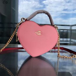 Les sacs à main de luxe de créateurs se vendent à un prix Aolai New Qixi Exclusive Love Bag Sac à main Un sac à bandoulière Valentines Day Limited Womens