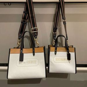 Designer luxe handtassen worden verkocht voor een prijs Olay New Field Color Block Handheld boodschappentas Sportgeweven riem Eén schoudertas