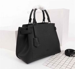 Designer Luxury Sacs à main en cuir véritable Femmes Messenger sac à bandoulière Portable Toto sac Noir Bleu size32.5 * 14.5 * 23cm M53645 M53730 sacs à main