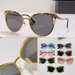 Diseñador de lujo para hombres y mujeres SERPENTI SUNGLASSES moda ojo de gato metal Glasrai Sola con esmalte de colores escamas de serpiente patas de espejo curvadas viajes y vacaciones BV6083