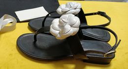 Diseñador Sandalias de lujo Flats Ballet Mujeres Mulas de una sola zapatilla Sandalia Sandalia de cuero genuino Camas informales Flip Flip Tamaño 35-41 Camellia