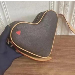 Designer Luxury Sac à bandoulière pour femmes sacs sacs de coeur rouge sac en forme de monnaie à bandoulière