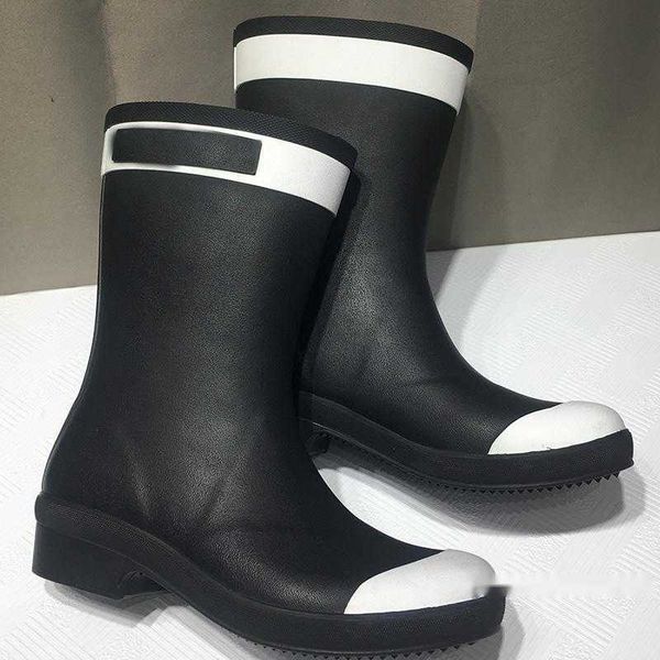 Botas de lujo de diseñador para mujer, zapatos de invierno a la moda para mujer, Botas de lluvia, botines de colores mezclados en blanco y negro, botas de tacón bajo para mujer