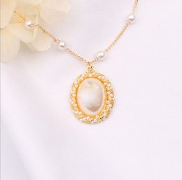 Diseñador de lujo de las mujeres suéter cadena de aleación collares largos colgantes nueva joyería marca carta perla cristal oro colgantes de moda collar