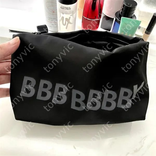 Diseñador Maquillaje Bolsas Luxurys Bolsa de aseo Bolsa de cosméticos Bolsos de embrague B Monederos Mujeres Bolsas de maquillaje Estuches Bolsas de viaje Gran capacidad 2312296D