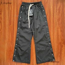 Designer Man Hellstar Nylon Button Mens Black Designer Pant de haute qualité Woemn Men Jogger Fashion Hip Hop Casual Pant Pantalon Lovers Street Tracksuit 352