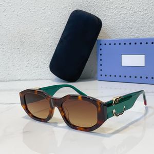Gafas de sol de diseño poligonales de moda para hombres y mujeres con patas retro de gran tamaño y lentes resistentes a UV400 con estuche protector GG0630