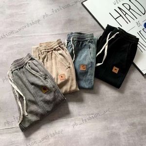 Ontwerper mannen Carharts broek en overalls Vintage Amerikaanse jas Cargo broek slank geschilderd Patch uitloper Carharts Jeans 661 484