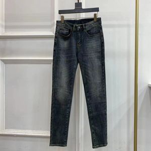 Jeans da uomo firmati Pantaloni slim elasticizzati con alfabeto ricamato dell'industria pesante dei jeans dei cartoni animati