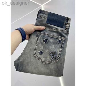 Designer heren jeans high -end trendy Europees merk 2024 lente/zomer modieuze geborduurde elastische mannen slanke fit kleine voetblauwe jeans jj87635