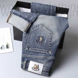 Jeans pour hommes de créateurs Nouveaux jeans brodés pour l'automne et l'hiver petits pieds pour hommes coupe slim mode br taille moyenne élastique EZS9 4U7Q