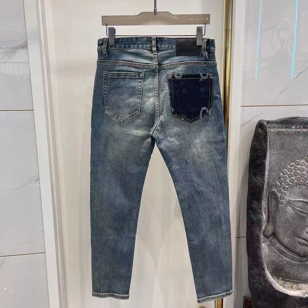 Jeans pour hommes de créateurs autocollants imprimés lettre personnalisée jeans de lavage vintage lâche stretch lavage droit résistant à l'usure pantalon décontracté patch rangée supérieure