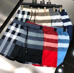 Pantalones cortos de diseñador para hombre tendencia de verano moda estilo callejero ropa de secado rápido traje de baño transpirable pantalones de playa estampado a cuadros de alta calidad tamaño asiático M-3XL