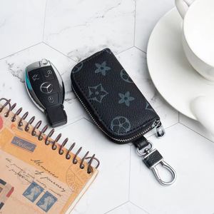 Designer Men Universal Car Key Sacs Case Unisexe Mâle de cuir authentique Veurs de clés de la touche Zipper Zipper Smart Keychain Cas Caves Keys Pouche Sac Portefeuille