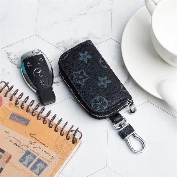 Designer Men Universal Car Key Sacs Case Unisexe Mâle de cuir authentique Veurs de clés de la touche Zipper Zipper Smart Keychain Cas Carseys264b