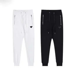 2023 Moda para hombre Pantalones de diseñador Hombres Mujeres Pantalones de color sólido Pantalones de movimiento de hip hop para hombres Joggers casuales Tamaño M-XXL