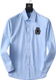 Diseñador camisas de vestir para hombres Moda de negocios Casco Classic Camiseta de manga larga Hombres bordado ropa de lujo talla asiática M-3xl