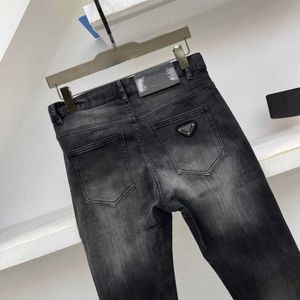Designer herenjeans Elasticiteit Jean luxe 5A jeans mode driehoek denim broek heren dames slanke stretch jeans zakelijke kleine voeten broek 15852 merk denim broek