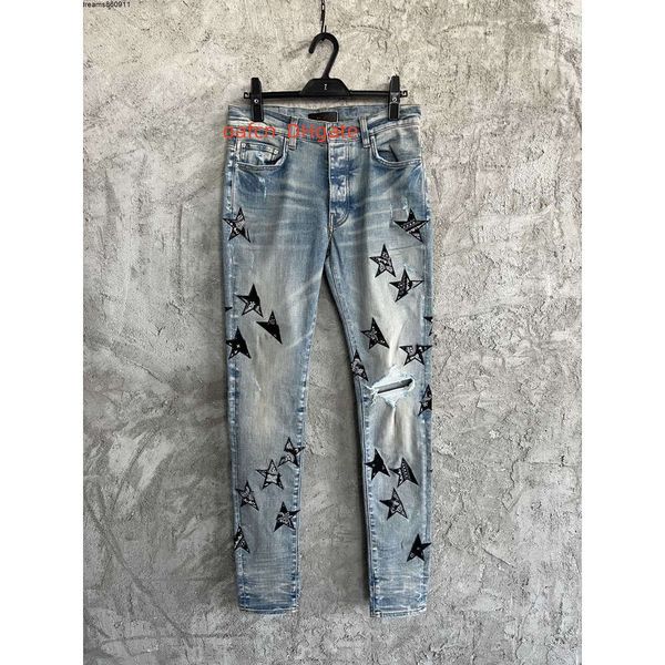 Pantalones vaqueros de diseñador para hombre con agujeros holgados adelgazantes con tinta salpicada pantalones vaqueros informales Hip-hop taladro de uñas hecho a mano