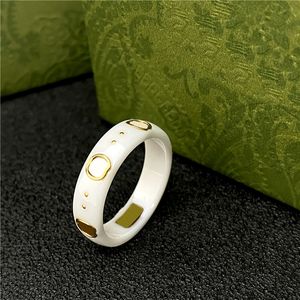 Designer mens anneaux Céramique Bande g lettre Anneaux Noir Blanc pour Femmes Hommes bijoux Bague En Or