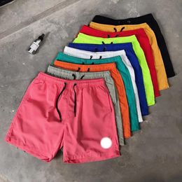 Diseñador pantalones cortos para hombre marca francesa hombres cortos deportes de lujo verano para mujer tendencia puro transpirable negro blanco moda personalidad pantalones cortos de natación pantalones de playa