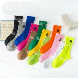 Calcetines de diseñador para hombre Letras Color caramelo Pareja Color sólido Calcetines deportivos transpirables Moda Paris Street Hiphop Estilo Calcetines largos y cortos