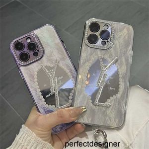 Cas de téléphone en métal de concepteur Couverture de téléphone de miroir de diamant de concepteur pour iPhone 14 14Pro 14Plus 13 12 Cas de couverture d'impression de marque de luxe avec chaîne de perlesS57Y