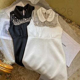 Designer mini -jurk luxueuze kristallen mouwloze Peter pan kraag korte jurken damesontwerper bodycon vakantiegang st6t st6t