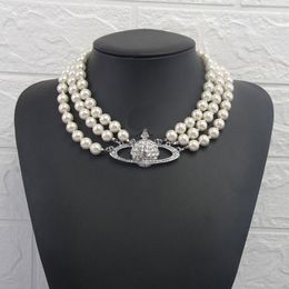Diseñador Multicapa Pearl Rehinestone Orbit Retro Collar cadena de clavícula Collares de perlas Exquisitas Collares de bodas para mujeres Regalo de joyería.