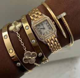 Bracelet à ongles design classique trèfle à quatre feuilles en acier inoxydable plaqué 18 carats en acier titane diamant pour femmes bracelets de charme