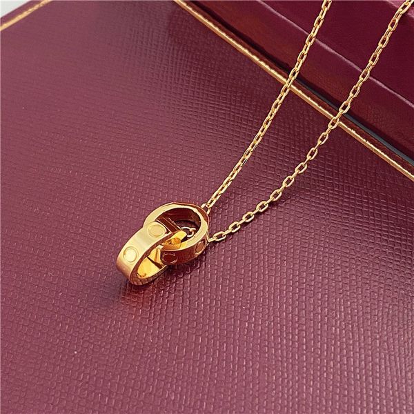 Collar de diseño Joyería de diseño Collar de trébol Anillos ovalados de moda de acero inoxidable Gargantilla de cadena clavicular Colgante de anillo doble de oro