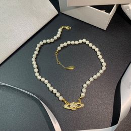 Collar de diseñador Joya de lujo para mujeres Collar perla Collar de perlas de diamantes Saturno Collar de clavícula versátil