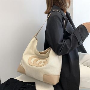 Designer nouvelle toile épaule unique polyvalente épaule unique messager fourre-tout grand sac maman sac grande capacité sacs à main Outlet322T