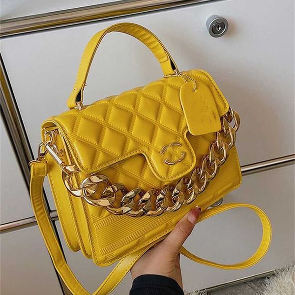 Diseñador Nuevo Pequeño Cuadrado Net Fahion Versión coreana Cadena Carta Messenger Hombro Monedero Bolso redondo Amarillo Outlet barato 50% de descuento