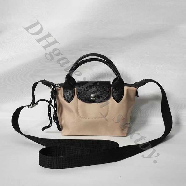 Designer Off Sac High Sales Quality Factory Stores Le dégagement de l'usine est à 95% Dumpling Handheld Environmental Series Nylon Weaving Back Back Hobo Sacs à bandoulière