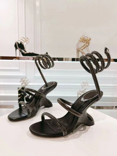 Diseñador Sandalias de serpientes de sexo opuesto con tacones inclinados, tacones altos exquisitos exquisitos, temperamento, zapatos para mujeres nuevos de socialité