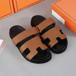 Designer Oran Sandals glissa les pantoufles sandales pour femmes chaussures de luxe en cuir toile de sandale d'été