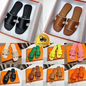 Designer Oran Sandals Dames Orang Claquettes schuift echte lederen strandschoenen Flat Heels Sliders Sandale dames mode luxe slippers Hermys Nermes Hemers