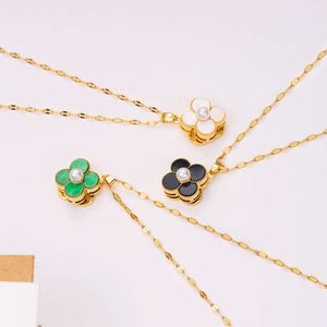 Colliers pendentif de créateur pour femmes élégant 4/quatre polyvalent nouveau collier de chaîne de collier de perles d'herbe rotative collier de mode conception de niche chaîne de collier en acier titane