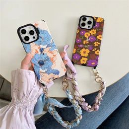 Couvertures de téléphonie de créateurs Couverture de fleurs de mode pour iPhone 15Promax 15pro 15 14promax 14pro 14 13 Pro Max 13 Girl Amid Gift Gift Spring Silk Wristband Chain Shockproofproof