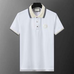 Polo de designer Hommes de luxe à manches courtes T-shirt décontracté High Street Fashion Haute Qualité Pur Coton Lettre de poitrine de couleur unie Chemise de sport respirante classique