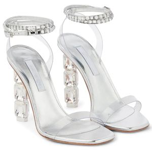 Bombas de diseñador Sandalias de mujer Cristal brillante Diamante de imitación con incrustaciones de cinta Zapatos de tacón alto Vestido transparente Zapato de cena de fiesta Moda de verano Sandalias blancas