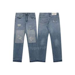 Diseñador de jeans morados para hombre de moda Jeans empalmados Pantalones de mezclilla rasgados Hip Hop de lujo Hombres desgastados Mujeres jeans negros Galerías