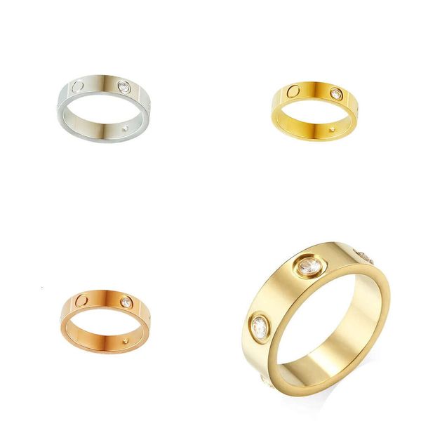 Anillos de anillo de diseñador para mujeres amas de oro llena de oro/chapado Mujer Titanium Banda de acero Joya Regalo Boda de boda Al Manejo de uñas S