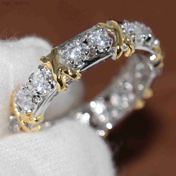 Anillo de diseñador Anillos Venta al por mayor Eternidad profesional Diamonique CZ Diamante simulado 10KT Oro amarillo blanco Relleno Anillo de boda Anillo cruzado Tamaño 5-11