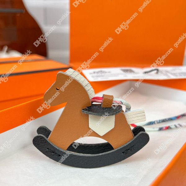 Designer Rocking a horse sacs à main sac décoration dame airpods cas décorations mignonnes fête présent sac à main modèle cadeau de mariage souvenir filles porte-clés