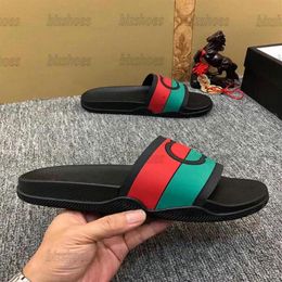 Designer Rubber Slipper 655265 Sandale à glissière G entrecroisée pour hommes Femmes Sandales plates à rayures rouges Italie Luxurys Summe282W