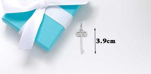 De 925 Silver Star van de ontwerper Silver Star Same Style Pendant Iris Key Dames Long Sweater Chain Necklace