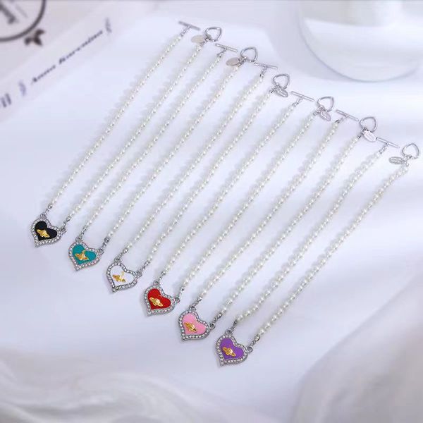 Collier Saturn le plus vendu du créateur, fait à la main pour les femmes avec des nœuds de perles, des points de diamant en forme de cœur, des gouttelettes d'huile et une chaîne de clavicule de haute qualité